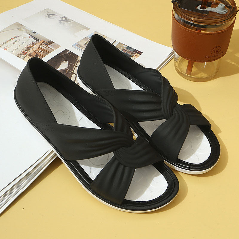 Comfortabele sandalen met een effen kleur strikje