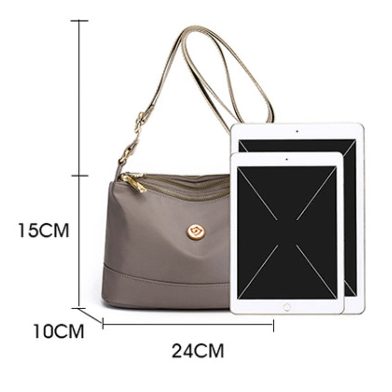Minimalistische ruime nylon schouder- en crossbodytas