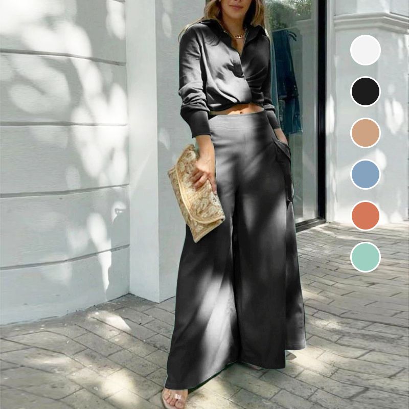 Elegante tweedelige set: top met lange mouwen en boord en broek met hoge taille