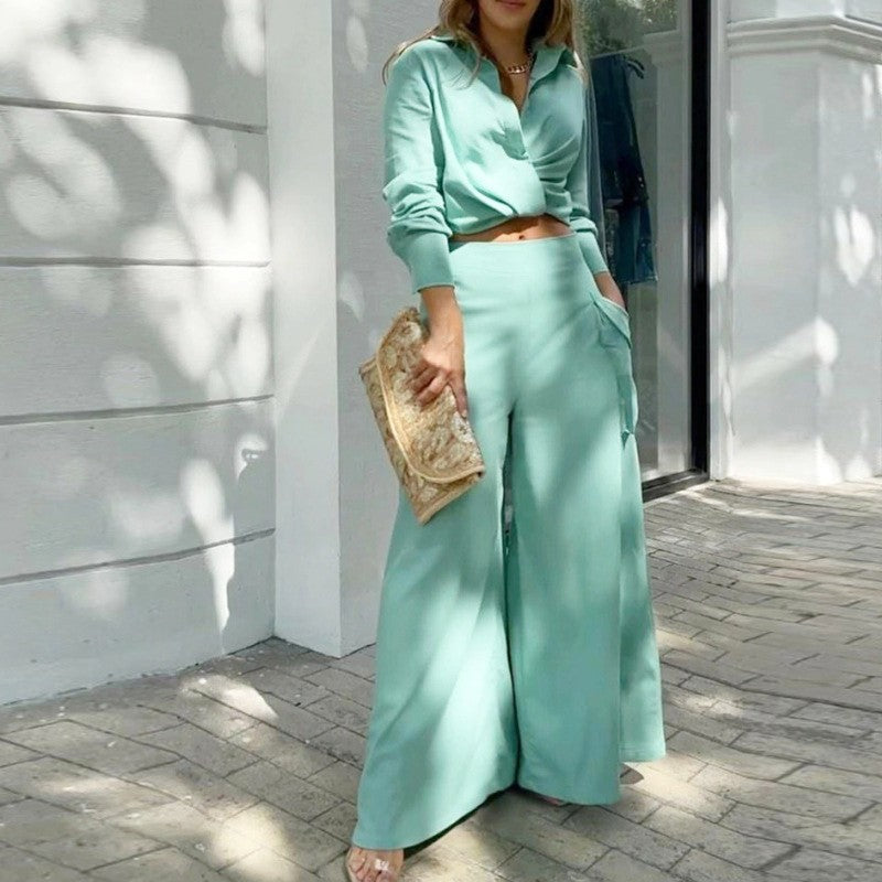 Elegante tweedelige set: top met lange mouwen en boord en broek met hoge taille