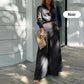 Elegante tweedelige set: top met lange mouwen en boord en broek met hoge taille