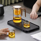 Water afscheidings glazen theepot met houten handvat