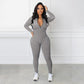 Effen kleur naadloze jumpsuit met halve rits