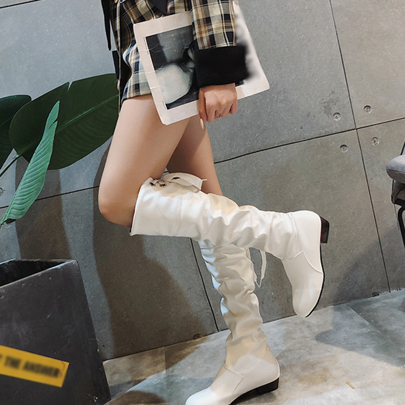 Elegante hoge laarzen met strikdetail