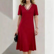 Elegante damesjurk met V-hals en mesh