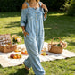 👗👖 Jumpsuit met open schouders, wijde pijpen en zakken