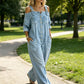 👗👖 Jumpsuit met open schouders, wijde pijpen en zakken