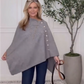 Stijlvolle poncho met knopen aan de zijkant voor dames