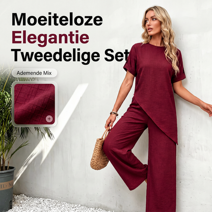 Set van top met asymmetrische zoom en wijde pijpen broek