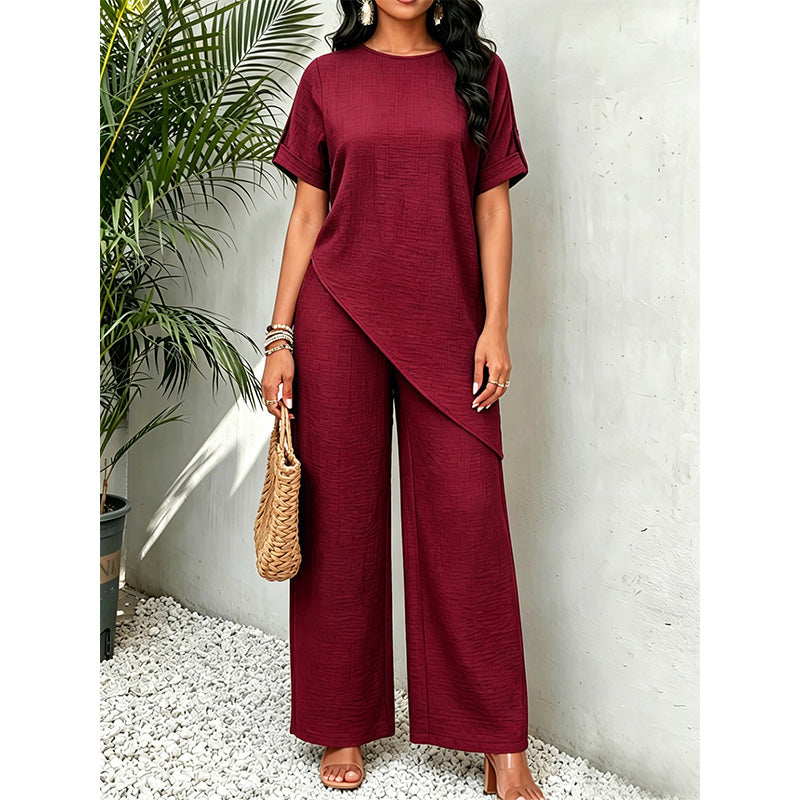 Set van top met asymmetrische zoom en wijde pijpen broek