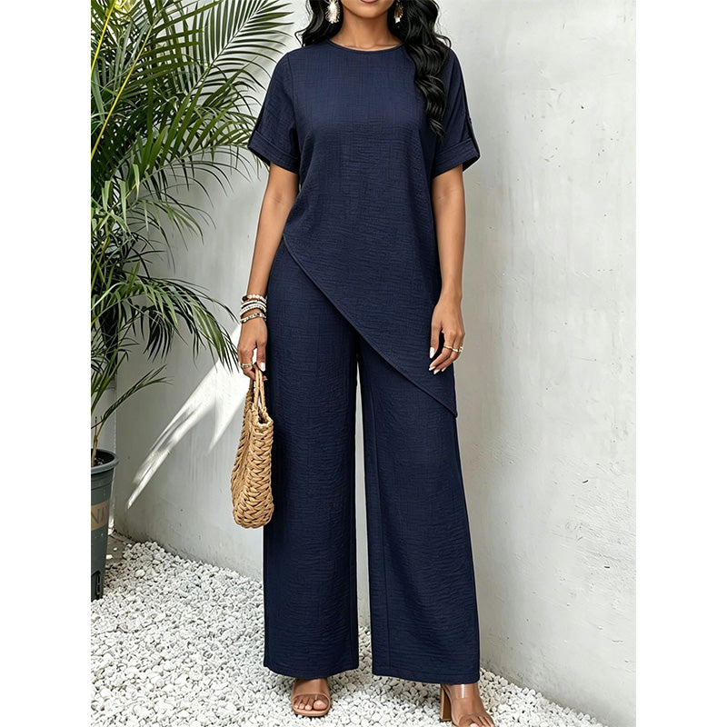 Set van top met asymmetrische zoom en wijde pijpen broek